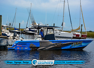 Crystal Coast Graphics designed and installed this custom boat wrap for .