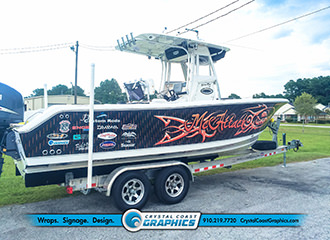 Crystal Coast Graphics designed and installed this custom boat wrap for .