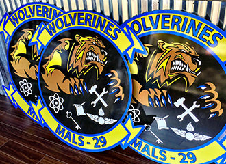 Crystal Coast Graphics designed and produced this sign for the Wolverines Marine Aviation Squadron 29.