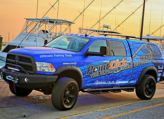 Crystal Coast Graphics vehicle wrap of the PointClickFish.com Ultimate Fishing Truck.