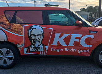 Crystal Coast Graphics designed and installed this KFC car wrap.